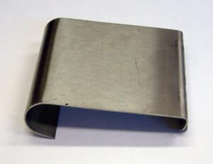 Photo shows a centre clip for a WeedSwiper. It's a metal clip, square shape, turned over at one end.